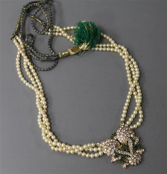 A triple strand cultured pearl necklace with yellow metal and paste set pendant, 42cm.